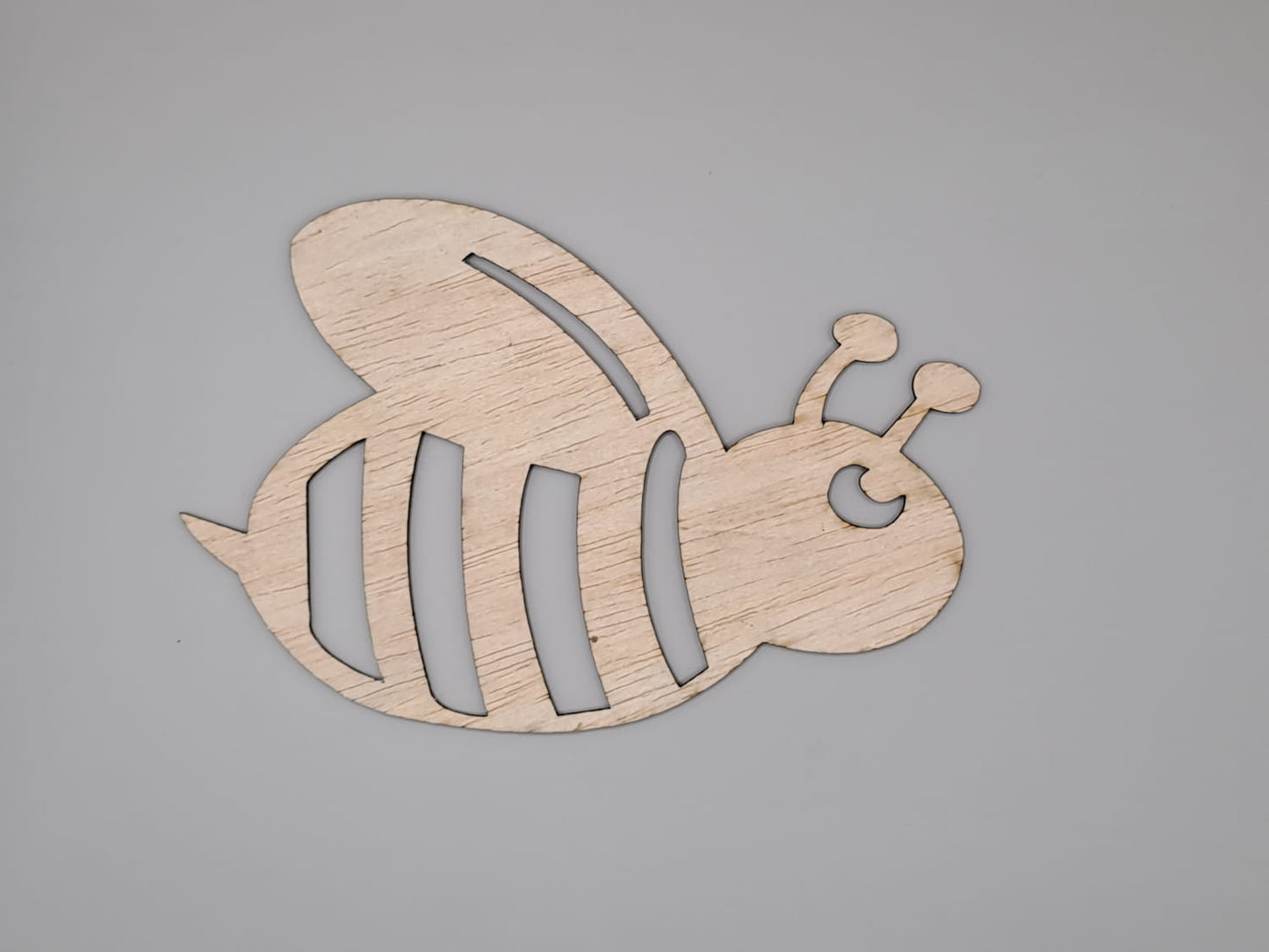 Laser Cut Wooden Bee Shape for Crafts and Decoration Vector